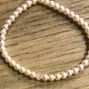 Pearly white bracelet handmade with purple charm